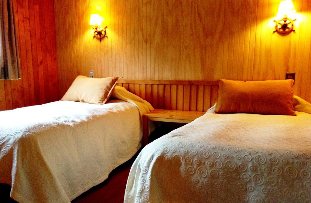 Cabanas Palafitos Los Pescadores Кастро Номер фото